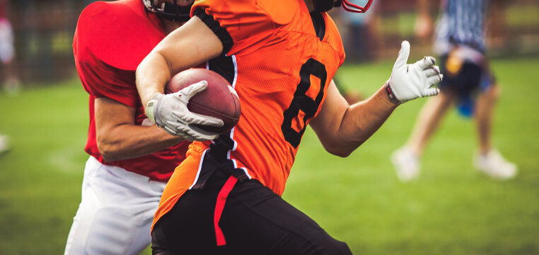 american football players during a game