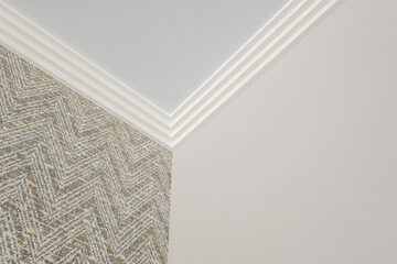 Detail of corner ceiling cornice with intricate crown molding. © hiv360