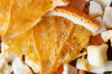 a piece of dried orange for the tea mixture close-up. macro photo