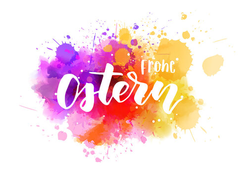 Frohe Ostern - Happy Easter in German. Abstract watercolor imitation splash background with calligraphy text. Easter concept background. Purple and blue colored.