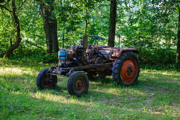 old broken tractor in the field