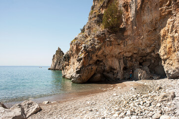 The cliff spur where the 'Buondormire' beach ends with the ‘Coniglio islet’ nearby.