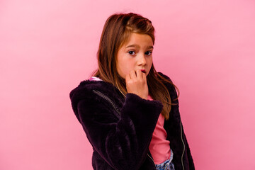 Little caucasian girl isolated on pink background