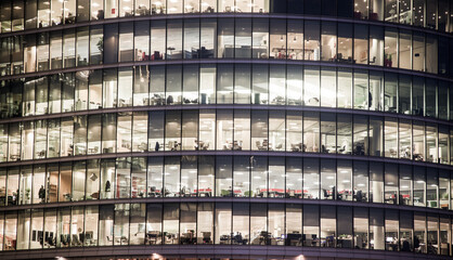 Fototapeta na wymiar business office windows at night Corporate building London City England