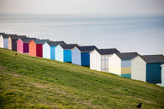 row of beach huts in Tankerton near Whitstable in Kent - British summer