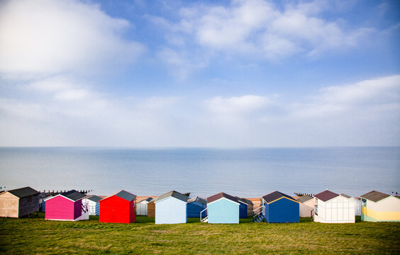 row of beach huts in Tankerton near Whitstable in Kent - British summer