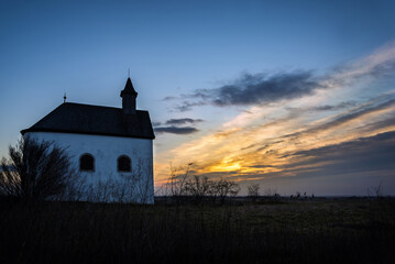 Small Chapel at sunrise in Burgenland near oggau