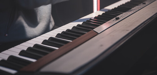 Close-up of musical keys in the studio.