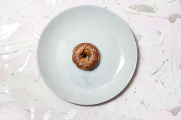 Handmade craft project. Making doughnut chocolate egg nest for Easter. Step by step photo instruction. Step 3