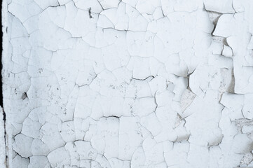 Horizontal background of old dirty faded effect cracked white