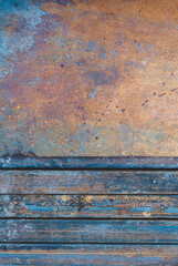 Rusty metal background, scratches texture close-up, old metal sheet, textured surface, outdoor material.