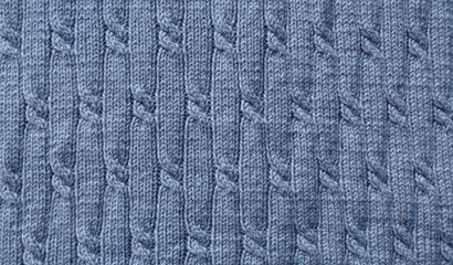 Knit pattern. Close-up of knitted wool texture.