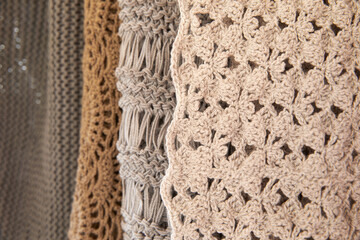 Closeup of stack sustainable cloths, homemade, handmade knitting and eco friendly fabric 