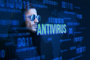 Beautiful stylish man on dark virtual reality background. Cryptocurrency, finance, future technology, innovative ideas concept. Futuristic holographic interface to display data.