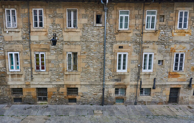 windows in medieval square of the basque country