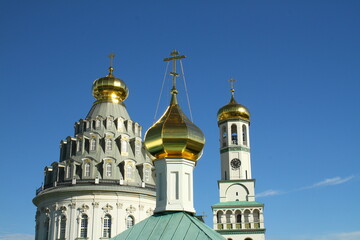 Fototapeta na wymiar Domes of the New Jerusalem Monastery. Istra, Moscow region, Russia