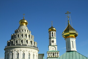Fototapeta na wymiar Domes of the New Jerusalem Monastery. Istra, Moscow region, Russia