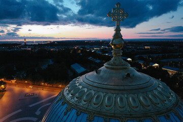 Aerial view of the Naval Cathedral of Nicholas the Wonderworker in Kronstadt at night. Kotlin Island. Detail of the southern facade. Marine anchor. Summer.