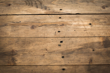 Dark old wooden table texture background top view. Selective focus