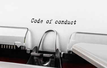 Text Code of conduct typed on retro typewriter