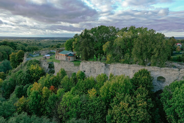 Fototapeta na wymiar Aerial view of the Defensive Fortress in the south-west of the Leningrad Region, on the edge of the Izhora Upland, in the village of Koporye. A platform for a high rocky promontory.