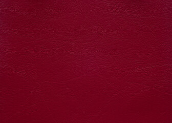 Close up leather texture crimson in color, background.