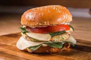 Vegetarian burger on wooden plate