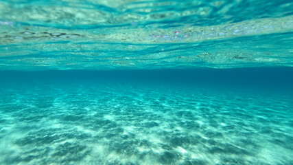 Underwater sandy sea bed in tropical exotic turquoise bay