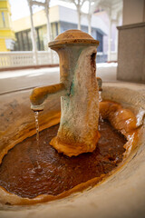 Hot mineral spring in Mill colonnade or Mlynska kolonada in Karlovy Vary spa in Czech Republic