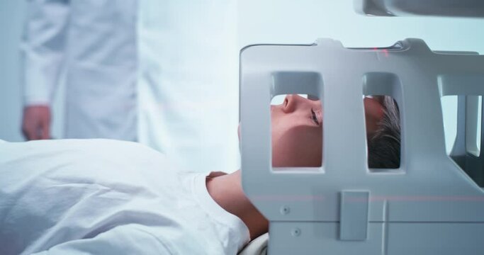 Child at end of brain MRI procedure