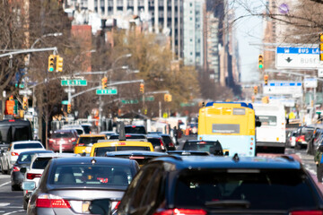 Cars, taxis and buses are crowded along 1st Avenue during rush hour traffic in Manhattan New York City
