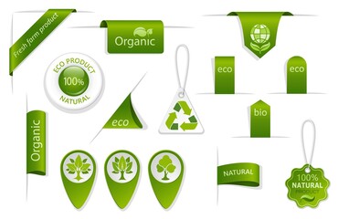 Set of green tags and labels. Eco and bio badges with leaves and trees. Farm, organic and natural symbols. Collection of tags and labels for fresh and ecological products. Isolation. Vector 