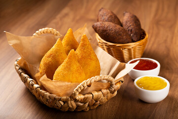 Coxinha of chicken with kibbeh, Traditional brazilian snack.