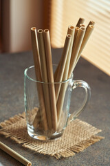 Bamboo straws in a glass