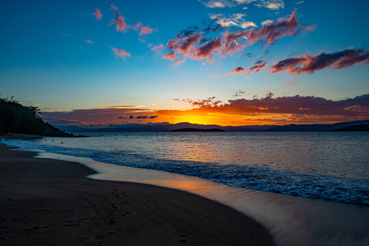 The lush colors of the sunset at Ponta do Sambaqui beach in Florian&oacute;polis, Santa Catarina, Brazil.