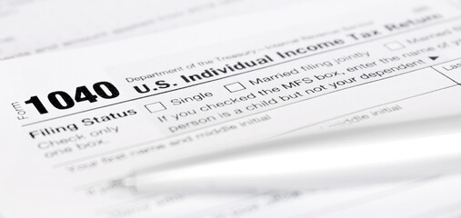 U.S. Individual Income Tax Return form 1040. Tax concept