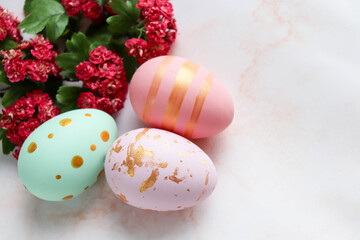 springtime. easter greeting card with easter eggs, flowers and willow twigs 