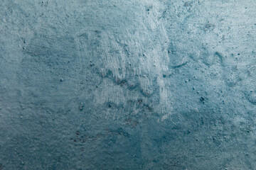 Painted different shades of blue on the wall. Abstract blue background