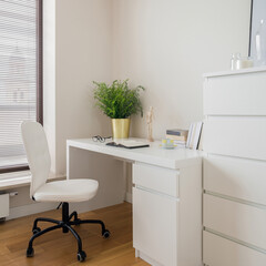 Simple white desk with chair