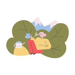Tourist sitting relaxing enjoying cup of hot tea or coffee during traveling in mountains