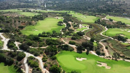 Albufeira, Portugal. Algarvian natural landscape within professional golf club. Natural surroundings of the lovely fairways along the golf court. High quality 4k footage