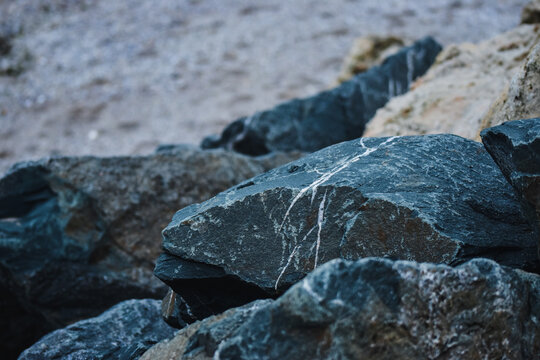 Closeup shot of weathered rock formations by the sea