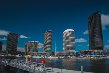 Fototapeta na wymiar Waterfront panorama of Docklands in melbourne, Australia on a beautiful summer day.