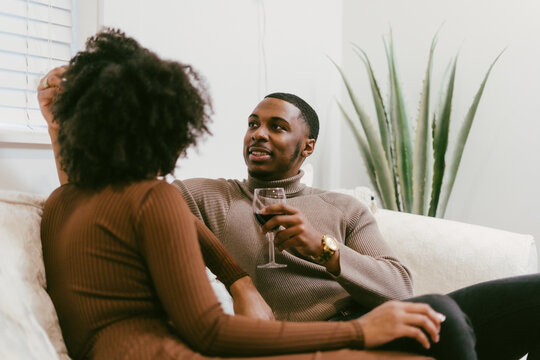 Intimate coversation, black couple at home