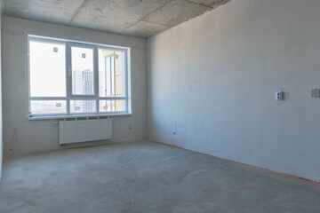 Obraz premium Typical rough finishing of an apartment in a new building. Real estate object
