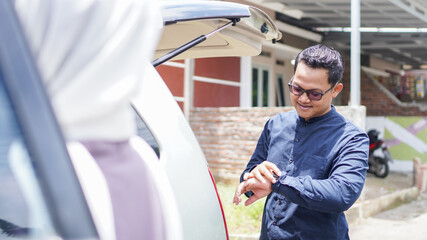 Muslim families travel back to their hometowns by car to celebrate Eid