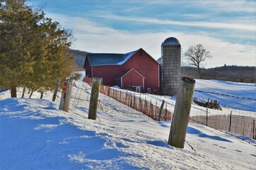 red barn in snow © john