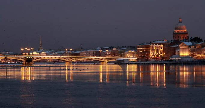 The panoramic footage of the winter night city Saint-Petersburg, Blagoveshchensky Bridge, the bridge of the lieutenant Schmidt, a night motionless panorama, St. Isaac's Cathedral, Palace Bridge