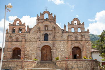 Fototapeta na wymiar Facade of the Main Church of Aratoca, Santander, Colombia, on February 20, 2021