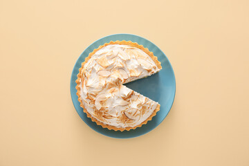 Tasty coconut pie on color background